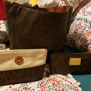Michael Kors purse, wallet and cosmetic bag